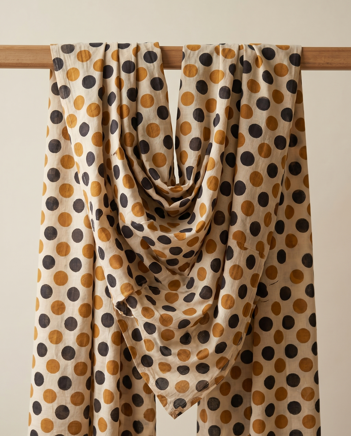 Bagru Daboo Block Print Cotton Fabric – Gold & Black Polka Dot