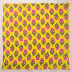 Yellow and pink hand block print cotton napkin laid flat, full print visible