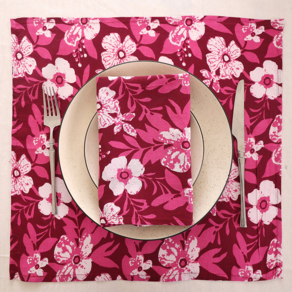 Berry and white block print napkin set as a place setting with plate and cutlery
