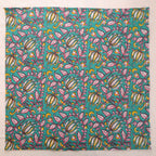 Teal and pink hand block print cotton napkin laid flat, full print visible