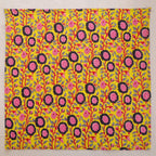 Chartreuse and pink hand block print cotton napkin laid flat, full print visible