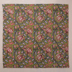 Olive and pink hand block print cotton napkin laid flat, full print visible