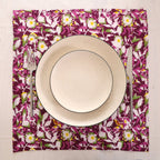 Purple and white block print napkin set as a place setting with plate and cutlery