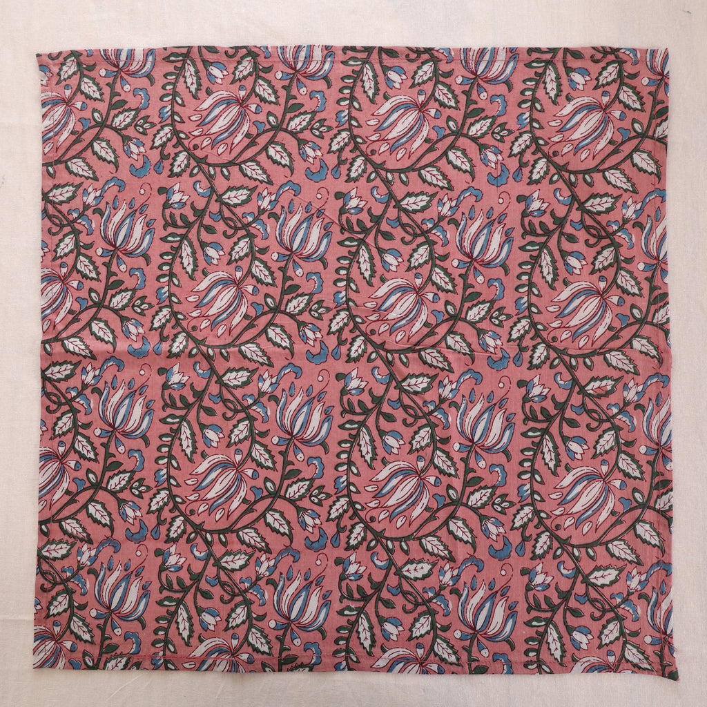 Dusty rose hand block print cotton napkin laid flat, full print visible