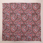 Dusty rose hand block print cotton napkin laid flat, full print visible