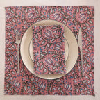 Dusty rose block print napkin set as a place setting with plate and cutlery
