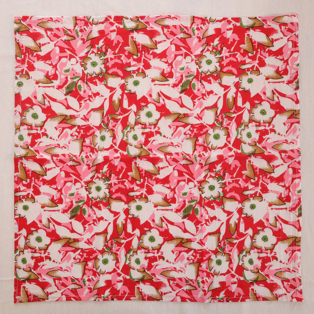 Red and cream hand block print cotton napkin laid flat, full print visible